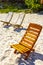 Palms parasols sun loungers beach resort Playa del Carmen Mexico