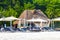 Palms parasols sun loungers beach resort Playa del Carmen Mexico