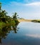 Palms reflecting in a Blue lagoon in Tayrona. Colombia Caribbean Coast. Cabo San Juan