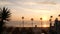 Palms and sunset sky, California aesthetic. Los Angeles vibes. Lifeguard watchtower, watch tower hut