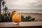 Paloma cocktail, on a wooden table with stunning ocean view, beach as the backdrop,. Generative AI