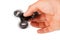 Palying with a Black Fidget Spinner