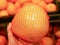 Pamela from the store. Buyers choose and buy pomelo citrus fruits at a supermarket stand