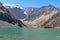 The Pamir range view and peaceful campsite on Kulikalon lake in Fann mountains in Tajikistan. Amasing colorful reflection in pure