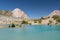 The Pamir range view and peaceful campsite on Kulikalon lake in Fann mountains in Tajikistan. Amasing colorful reflection in pure