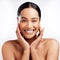 Pamper yourself a little. Studio portrait of a beautiful young woman posing against a white background.