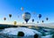 Pamukkale, Denizli, Turkiye - July 7, 2022 : Early morning balloon tourism activities in the sky floating above Cotton Castle or