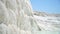 Pamukkale - famous gleaming white calcite travertines (terraces) on the cliff. Turkey