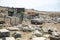 Pamukkale Park, Turkey. Ancient Hierapolis. Excavated area with antiquities, fenced with a mesh fence