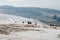 Pamukkale, Turkey, a breathtaking natural wonder that features a series of stunning terraced hot springs and travertine formations