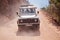 PAMUKKALE, TURKEY - September 18 2015: A group of tourists in a retro jeep rides a safari