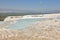 Pamukkale white mineral limestone natural pool. Geology landmark. Turkey