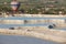 Pamukkale white mineral limestone natural pools and balloon. Turkey