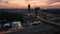 Pan Drone footage of buildings and buildings at Atlantic Station shot in 4k. Sideways pan of skyline in Atlanta at sunet