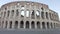 Pan left on ruins of Colosseum or Amphitheatrum Flavium largest amphitheater in the world an heritage of ancient Rome age