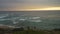 Pan move of a stunning sunset over Great Ocean Road in Twelve Apostles, Australia