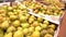 PAN Shelf full of fresh yellow and green apples