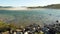 Pan shot of Batemans bay beach and ocean in New South Wales at sunset, Australia