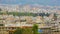 Pan shot of densely populated city, roofs of Mediterranean resort town, tourism