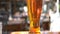 Pan shot of glass of cold beer