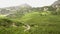 Pan shot of Tatra mountains in summer covered with green trees in Zakopane in Poland, Europe near Wielka siklawa waterfall