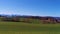 Pan of swiss mountains in Bern with green grass and mountains