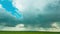 Pan tilt, 4K time-lapse, timelapse. Toned Sky - Light Blue Aquamarine With Rain Clouds On Horizon Above Rural