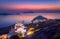 Panagia Thalassitra church and Plaka village view at sunset, Milos island, Cyclades.