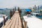 PANAJACHEL, GUATEMALA - MARCH 25, 2016:Wooden pier in Panajachel village, Guatemala. San Pedro volcano visibl