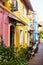 Panaji, India - December 15, 2019: A narrow lane surrounded by colorful portuguese houses in Panjim, Goa