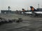 Panama, 28-11-2019: A large line with seven lufthansa airplanes waiting at the airport on a cloudy day