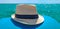 Panama style hat with the beautiful sea of â€‹â€‹Tuscany