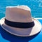 Panama style hat with the beautiful sea of â€‹â€‹Tuscany in the background