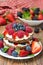 Pancake cake with whipped cream and fresh berries