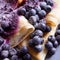 Pancake rolls with white cheese, blueberries and powdered white sugar