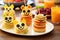 pancake stacks shaped and decorated like friendly animals