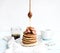 Pancake tower with fresh figs and honey on a