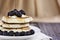 Pancakes Berries and Syrup Being Poured