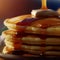 Pancakes with butter and honey illustration, closeup view on delicious pancakes stack, sweet homemade desert