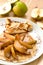 Pancakes with caramel pears. Rustic style. Wooden background. Top view. Close-up