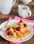 Pancakes with cherry, raspberry and vanilla sauce