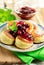 Pancakes with cranberry sauce