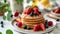 pancakes and fresh berries, fruit and honey