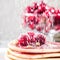 Pancakes homemade cake in stack decorated with berries frozen cherry Sprinkle with sugar powder on white plate