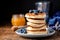 Pancakes with honey and blueberries