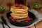 Pancakes hotcakes with berries and fruit served with maple syrup