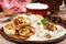 Pancakes with meat, mushrooms and sour cream sauce. Maslenitsa.