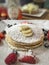 Pancakes on plate decorated with strawberry and banana