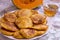 Pancakes with pumpkin in bowl on Halloween