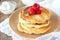 Pancakes with raspberry, mint and sour cream